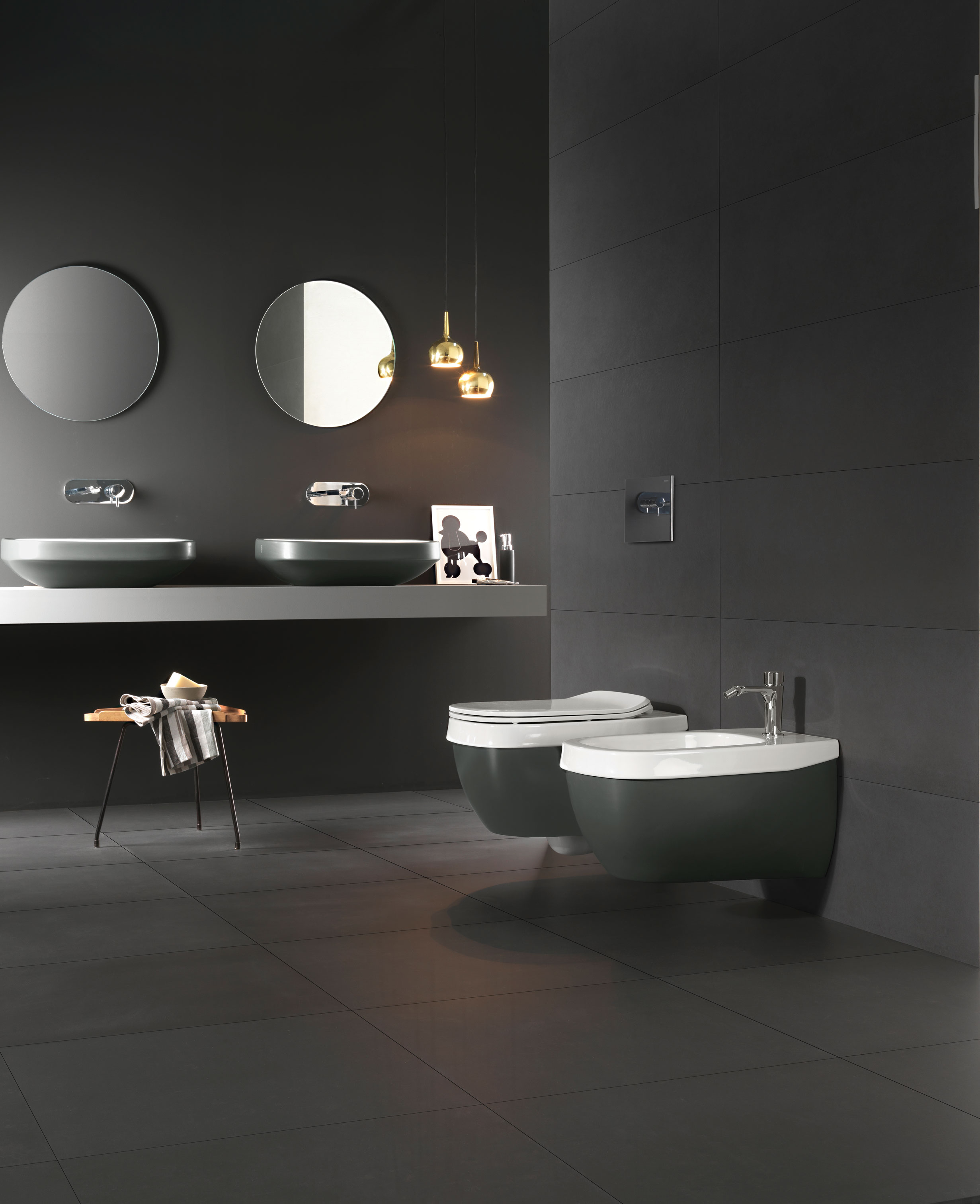 Michel César Hatria Abito black basins and wall-hung bidet and toilet.