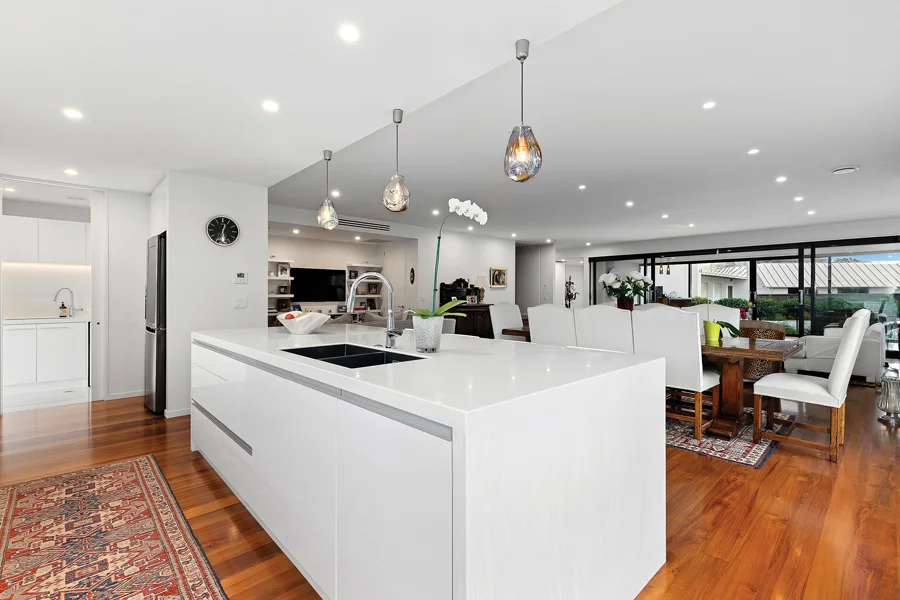 Interior: Beautiful rimu flooring adds warmth to the light and bright interior spaces.