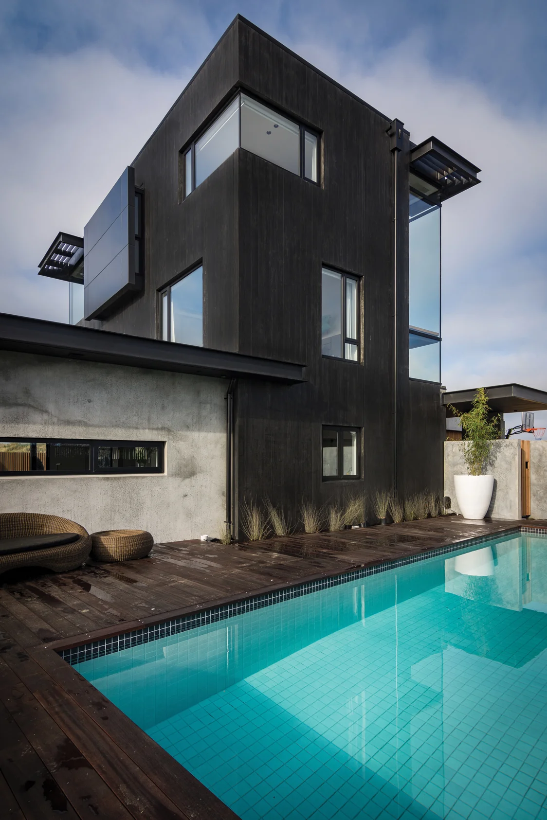 OUTDOOR FEATURES: The inground swimming pool construction and tiling along with the hard landscaping were completed by Lanyon and Le Compte, experts in concrete construction.