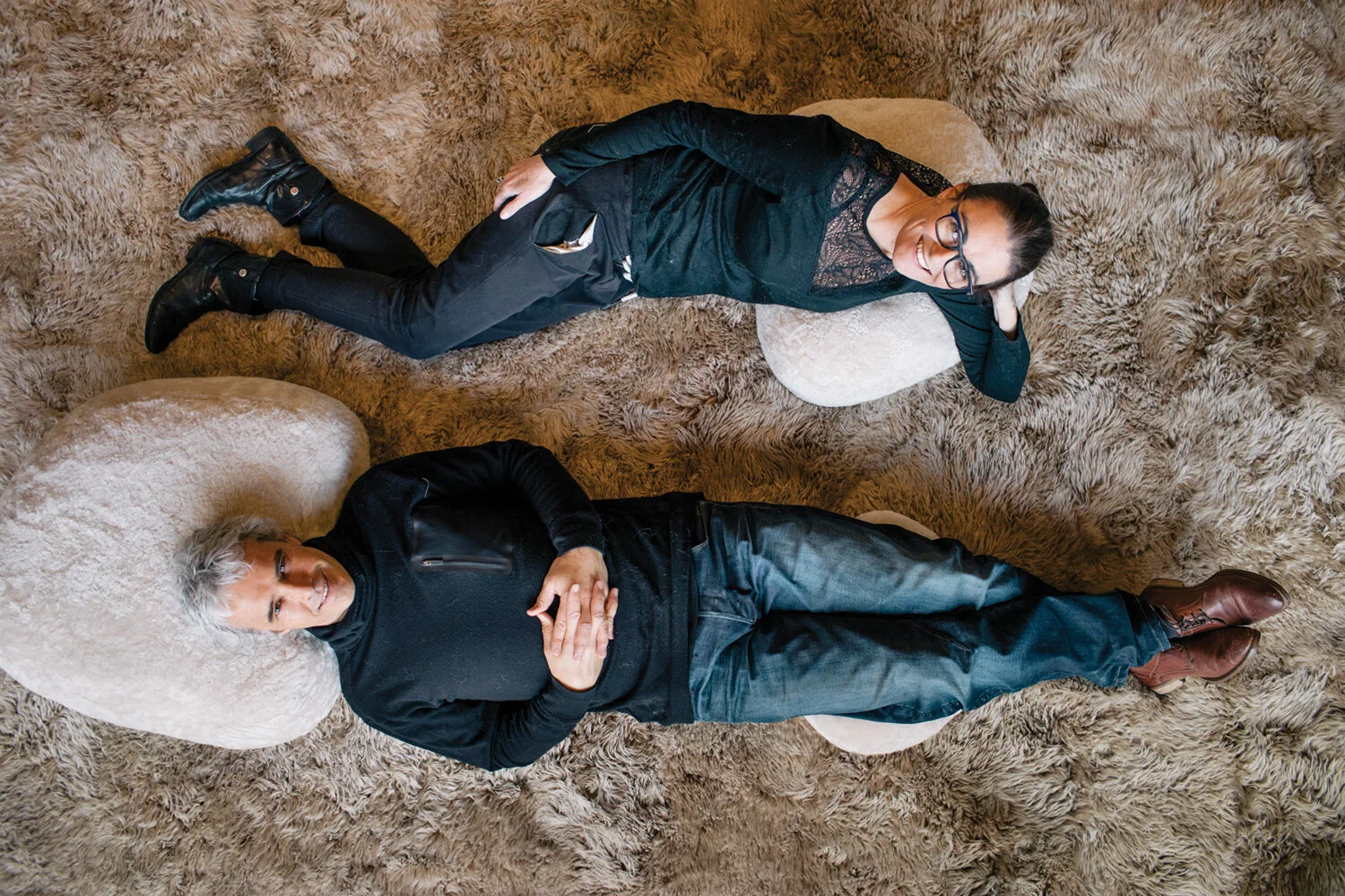 GROUNDED COMFORT Amanda Dorset and Ben Wilson enjoy this flexible approach to lounging with the natural warmth of wool.