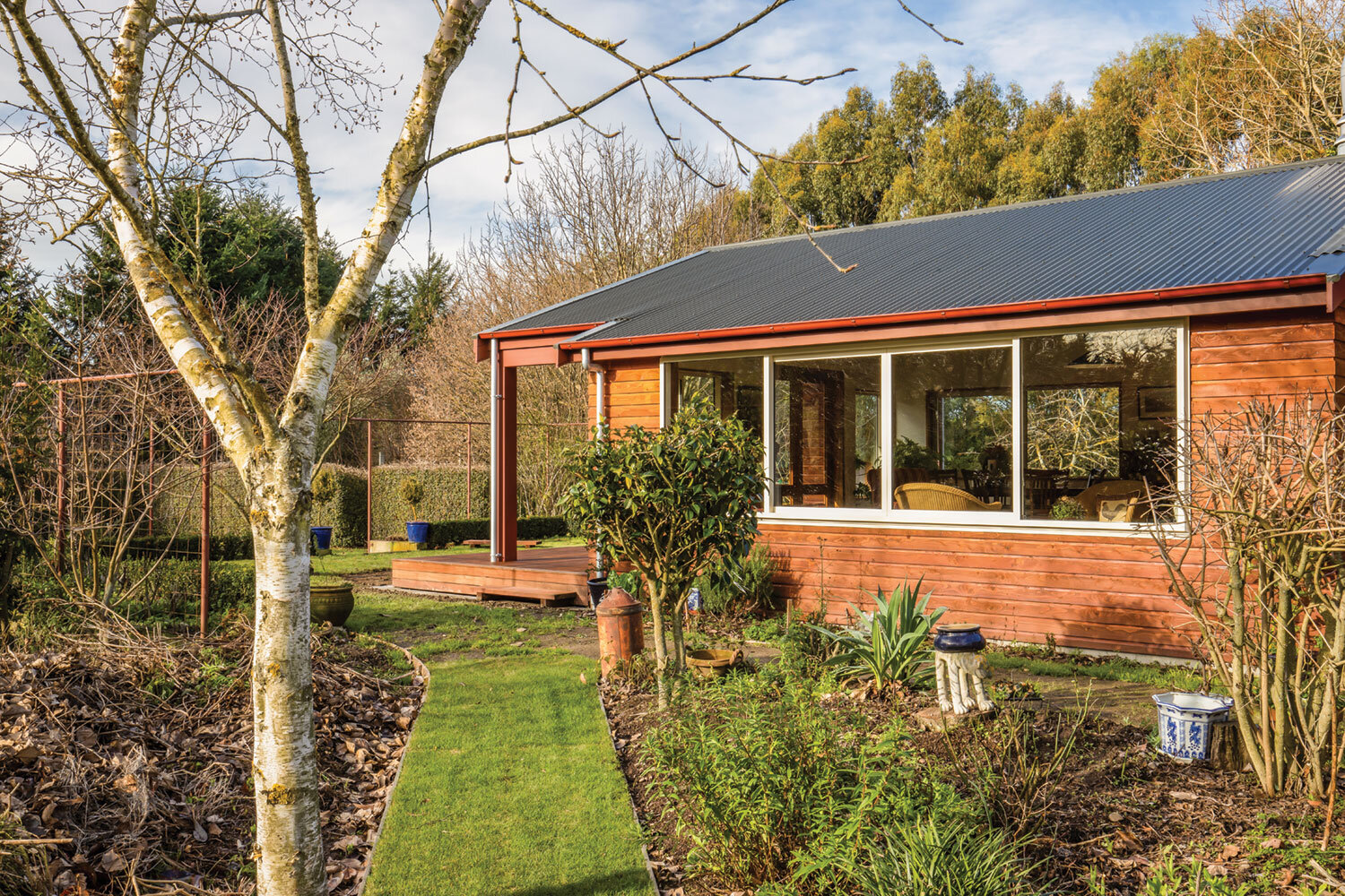OUTDOOR FLOW The large garden was excavated to accommodate the extension without compromising on space.