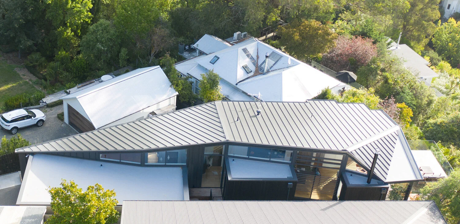 Superior seaming The Architectural Roofing Company’s Snap Lock steel tray system cladding complements the dramatic angles of the Slate Colorsteel roof.