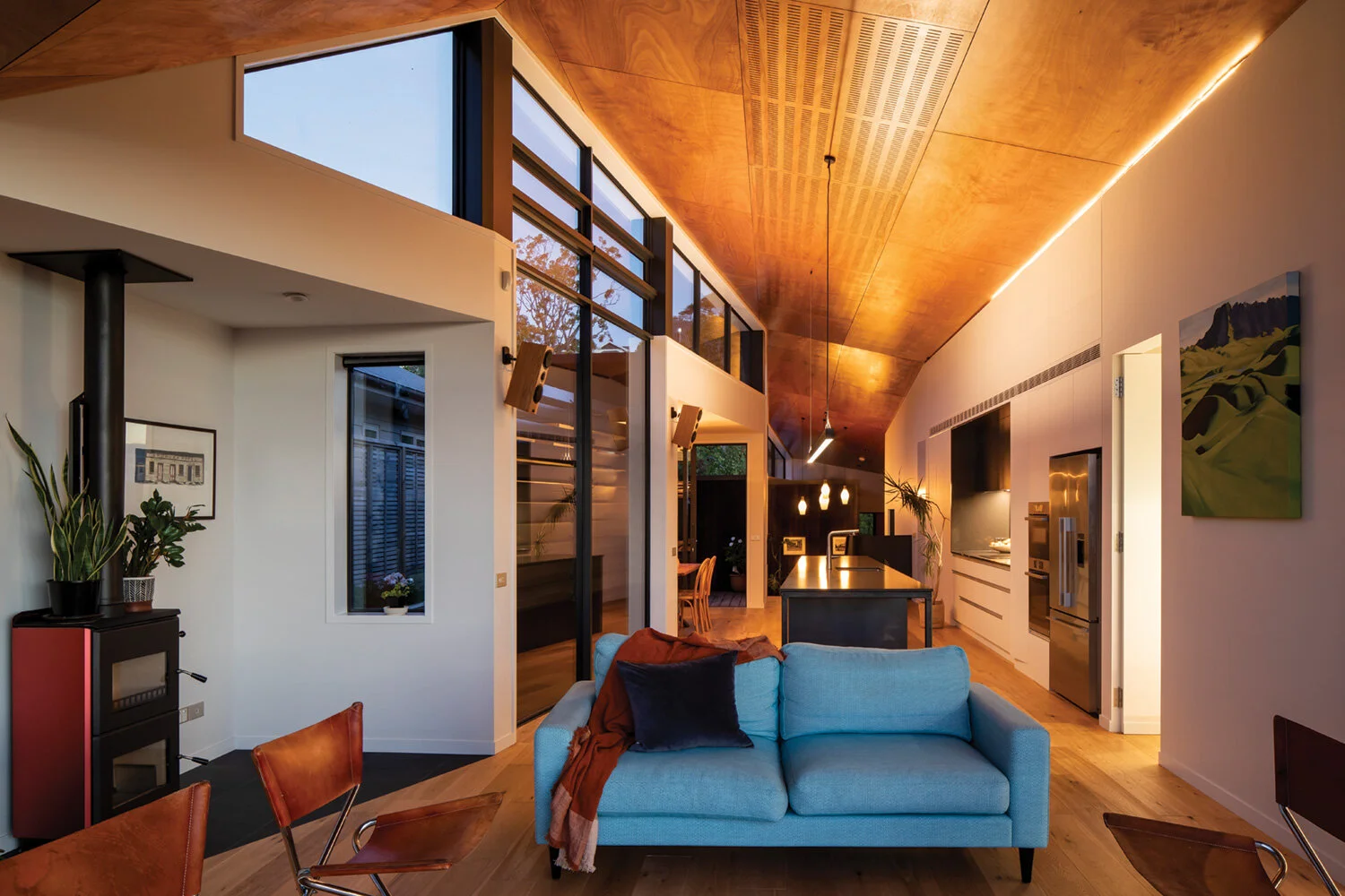 GOLDEN GLOW The ambient lighting is designed to enhance the golden wooden tones in the ceiling.