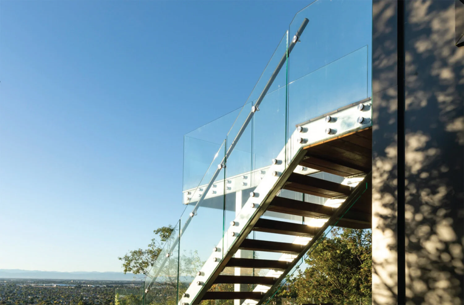 CLEAR VIEWS THE stunning city views from the balcony and stairs are uninterrupted thanks to Canterbury Balustrades.