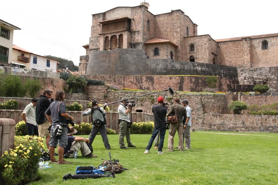 Filming an interview with the lead archeologist at the Temple of the Sun, Cuzco.