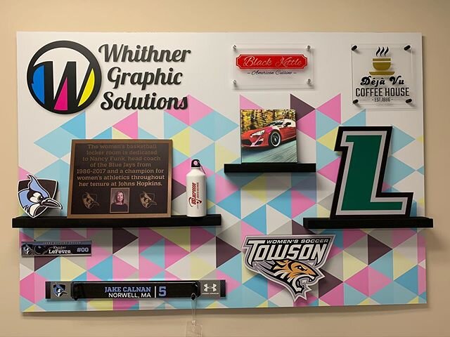 We took a few minutes to finish a display of some of our work.  #customprinting #3dgraphics #nameplates #athleticsignage #ACM #standoffs #acrylic #canvaswrap #promotionalproducts #metalprints #brandidentity #frenchcleat