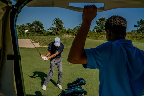 An instructor, Brian Hwang, drives at the Bridge club. Antonio Cortorreal, 15, is one of his students. Image: JOHNNY MILANO FOR THE NEW YORK TIMES