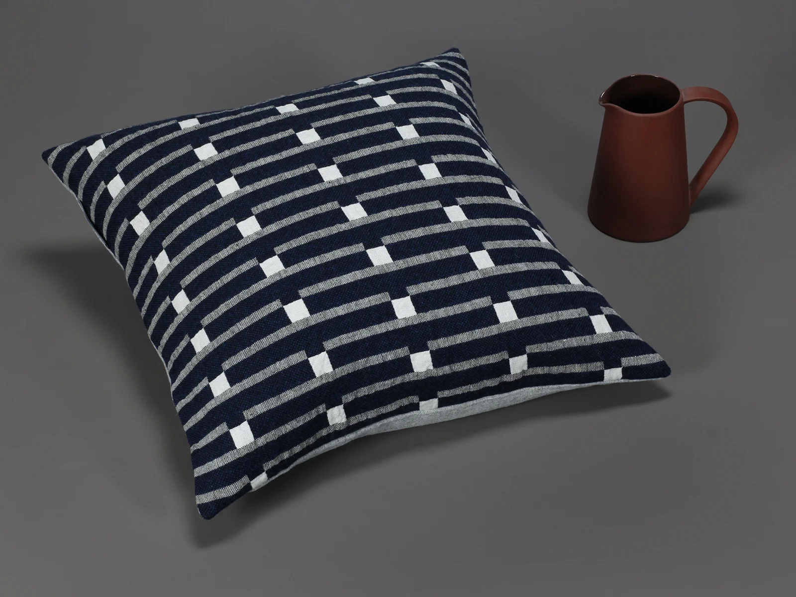 Eleanor_Pritchard_Broadchalke_ink_cushion_with_jug_by_Another_Country.jpg