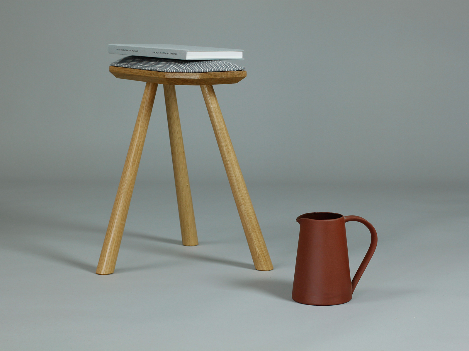 Mick_Sheridan_Pembroke_stool_upholstered_in_Eleanor_Pritchard_Heathfield_photo_Elliott_Denny.jpg