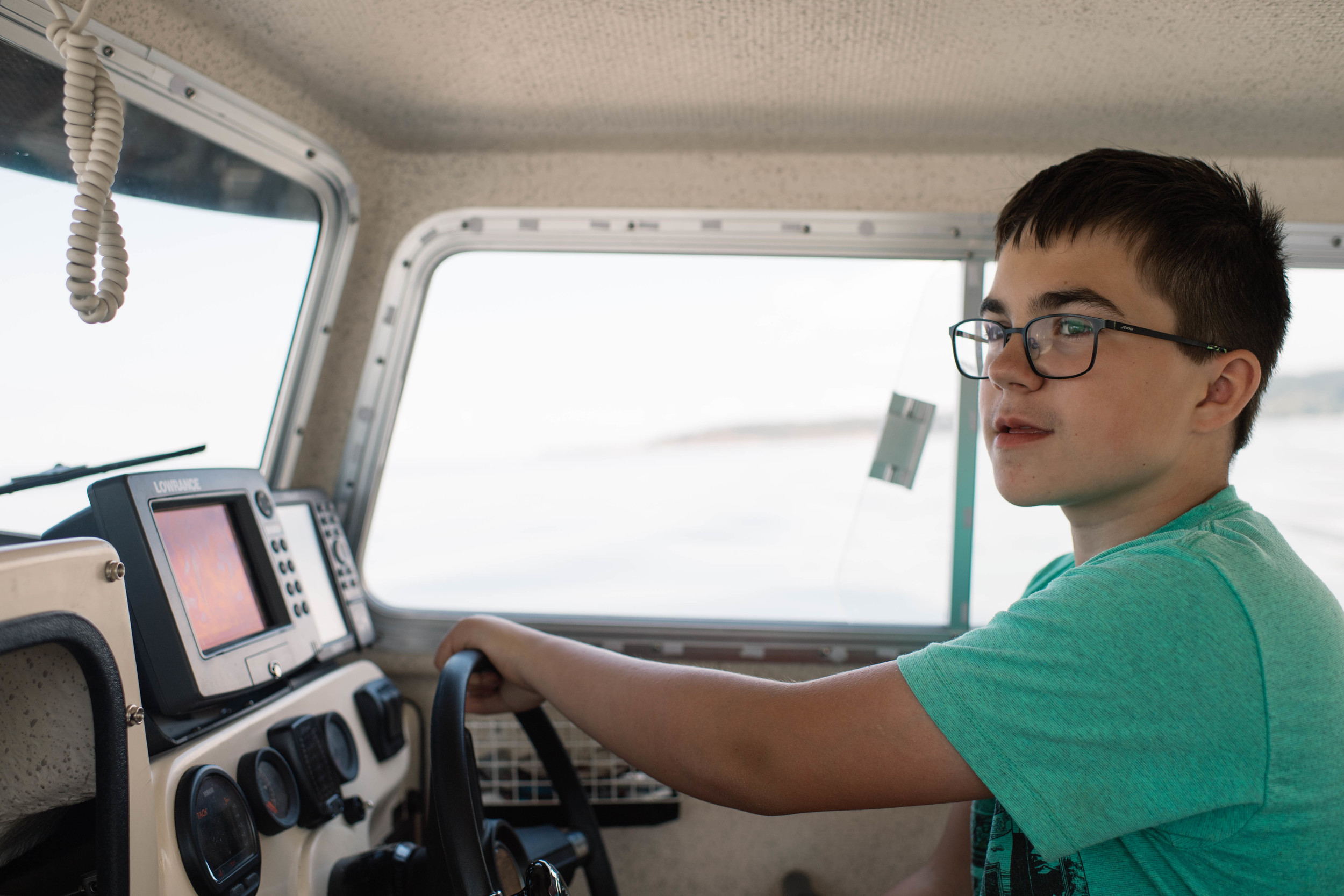 Kole has become quite the boat captain! 