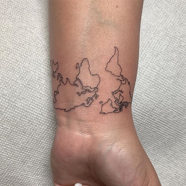 It&rsquo;s a small world @_caths_world_  done at #bodyelectrictattoo .
.
.
#tattoo #tattooing #fineline #finelinetattoo #worldtattoo #earth #latattoo #losangelestattoo #melrose #rayjtattoo #smalltattoo #tinytattoo #travel #walkintattoo #minimalism #m