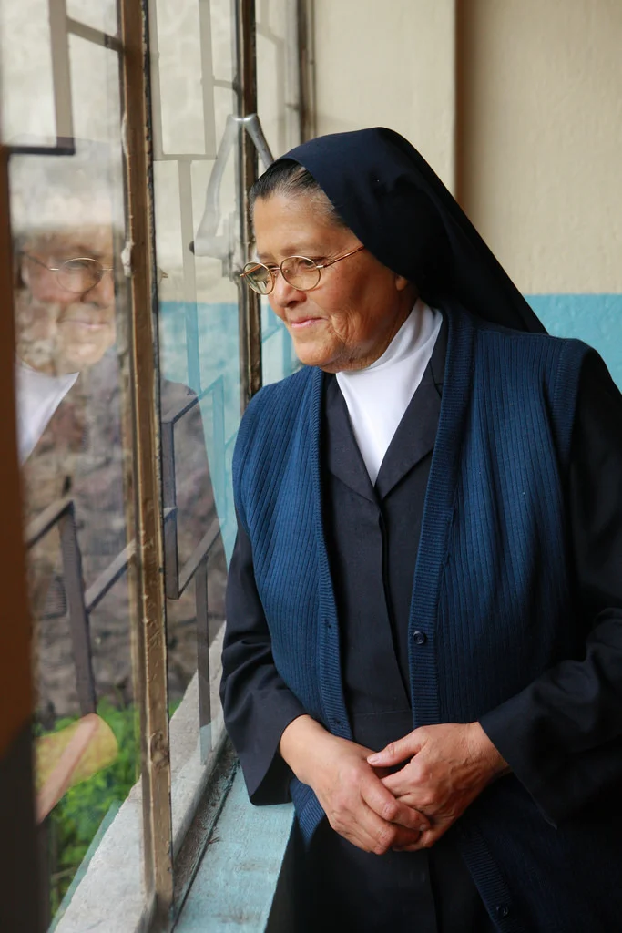 An orphanage nun (not Sor Mariana)