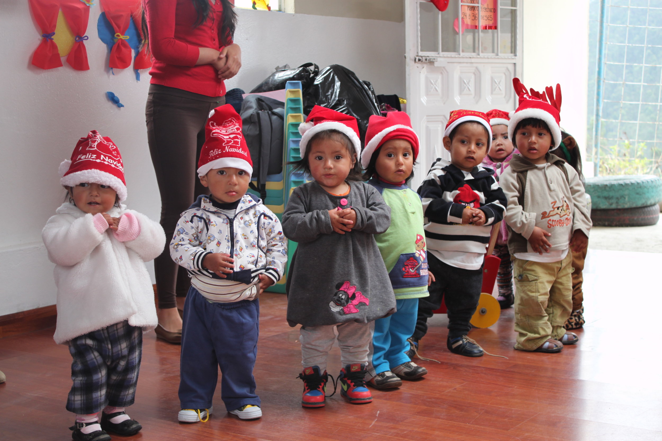 Christmas-_children_with_santa_hats.jpg