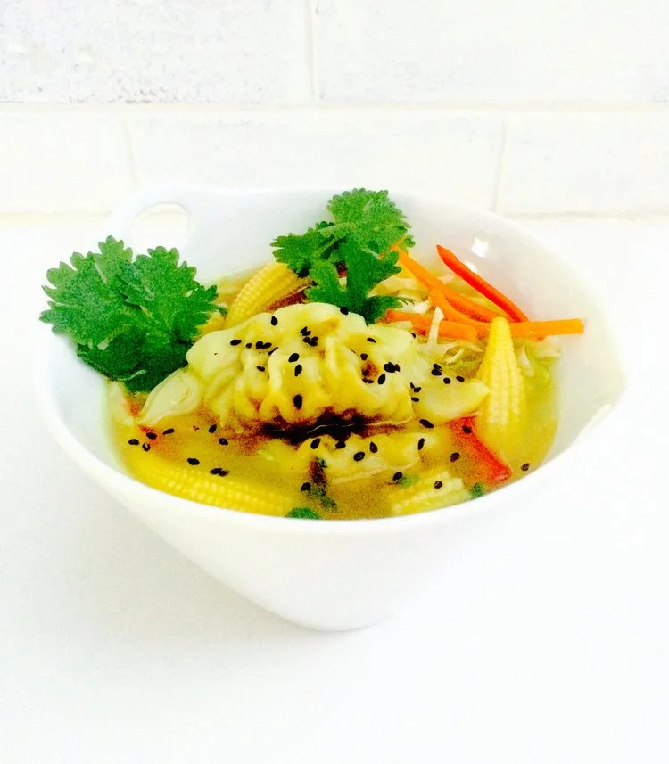 Chinese Dumplings on a Bed of Crisp Veggies 