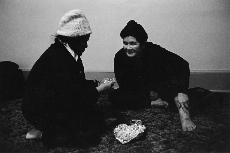 Dia Lee administering herbs to an ailing friend.  Oshkosh, WI  1984