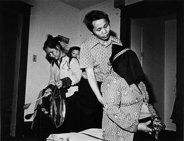 Dia Lee in a Shamanic trance with Joua Yang & Chia Her assissting. Oshkosh, WI 1985