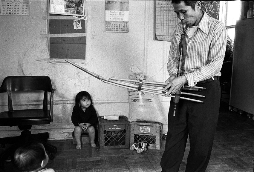 Joua Yang playing Kung in his apartment.  Chicago, IL  1983