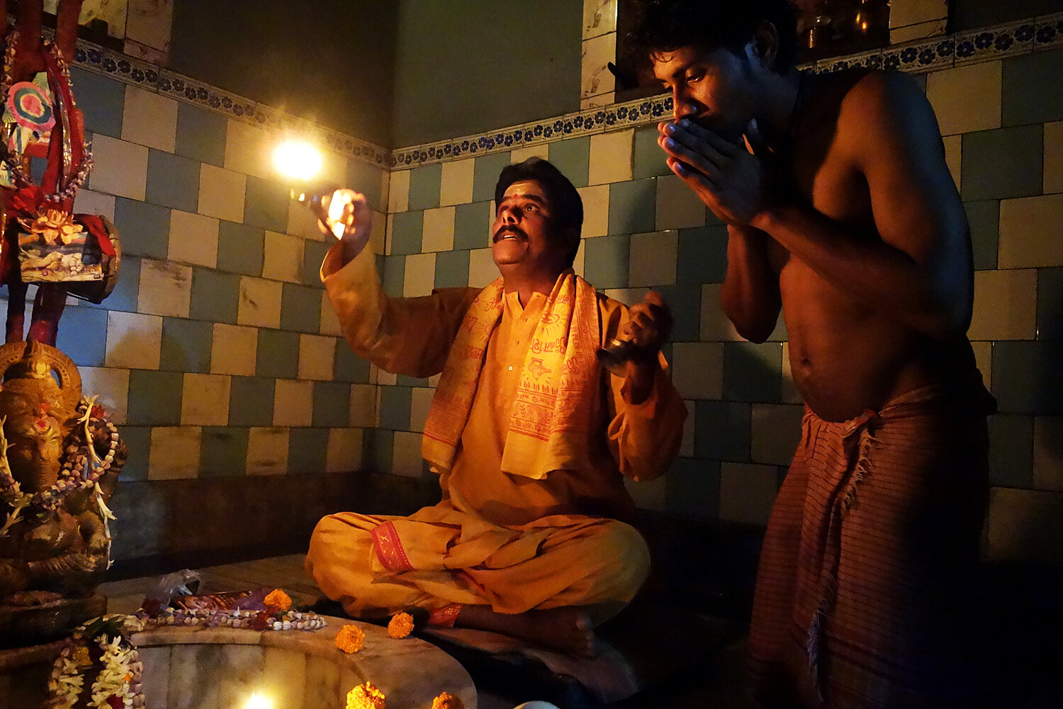 Priest in Shiva Inner Sanctum, Nandeshwar Temple, Kharagpur. 2014