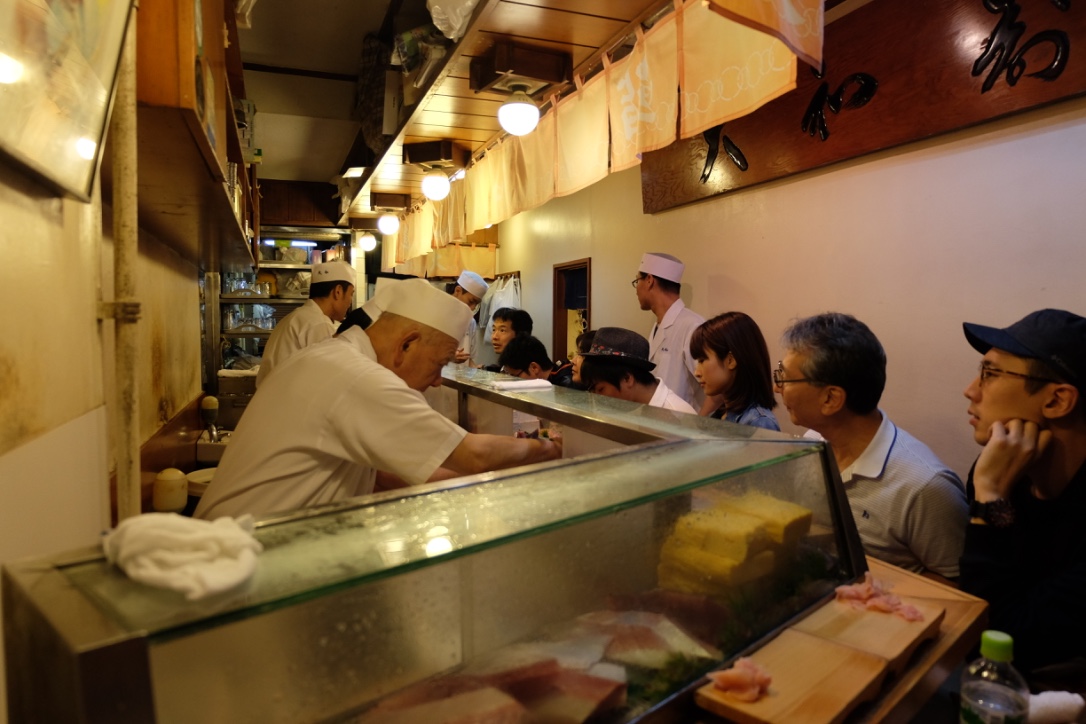 The Sushi Master at Daiwa prepping our first bites.