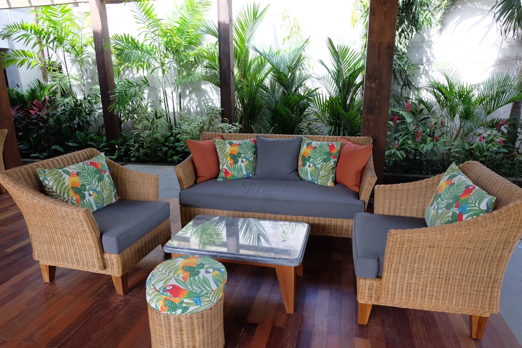 The open-air lobby area of the Alaya has lovely couches where you'll be served a welcome drink 