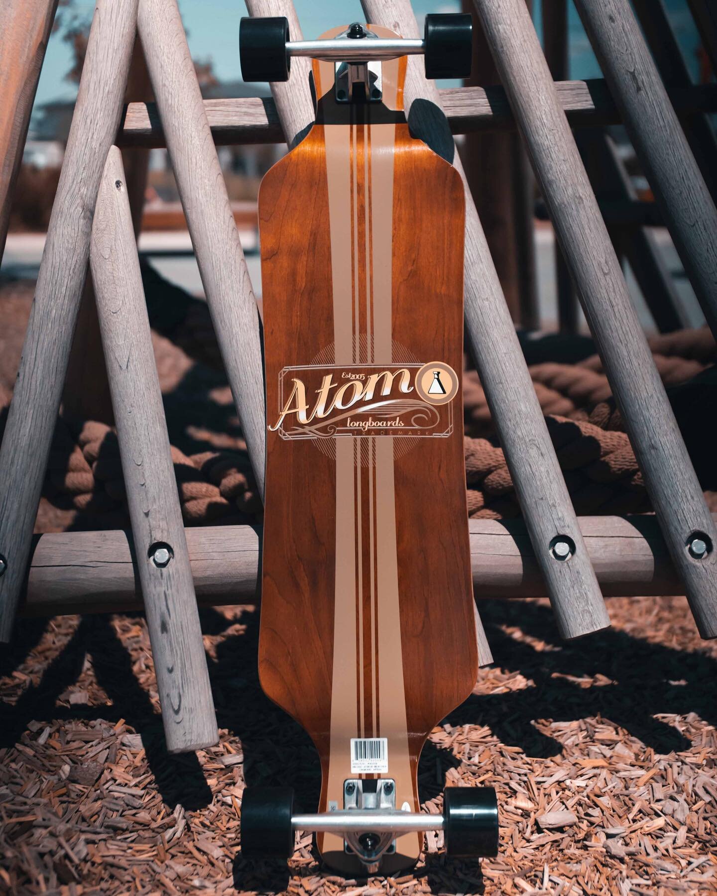 Atom has refined their drop deck line even further with the 39&quot; Micro Drop Longboard. 2&quot; shorter than it's big brother and with a little less drop, the 39&quot; Micro Drop feels as much at home cruising around town as it does bombing a hill