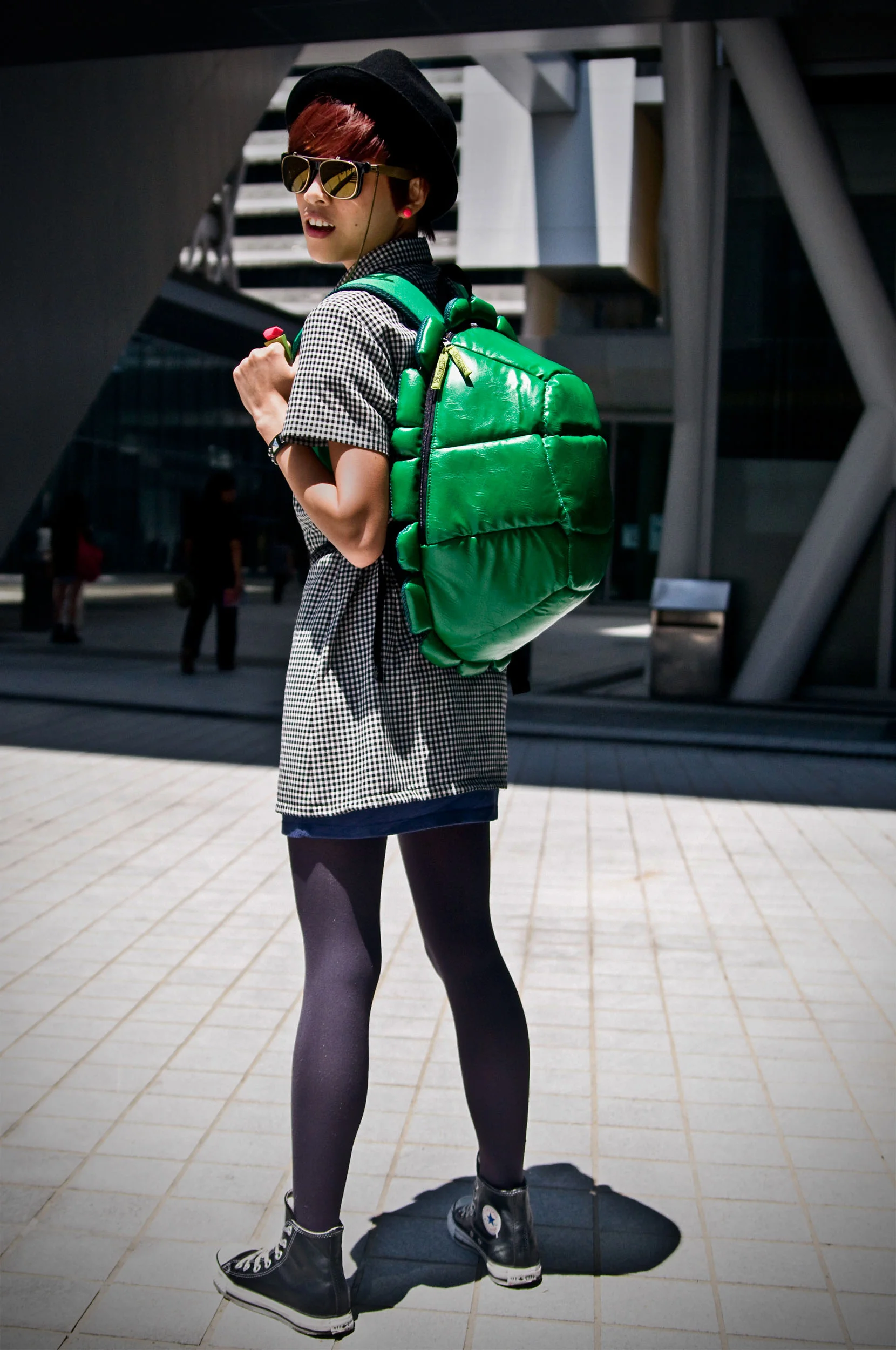 Noodles, Fashion Business "I bought my glasses from H&M. I like collecting glasses and scarfs. I like playful styles and dress in a funny way, like a toy. I always wear my bag. My favorite animal is a dog."