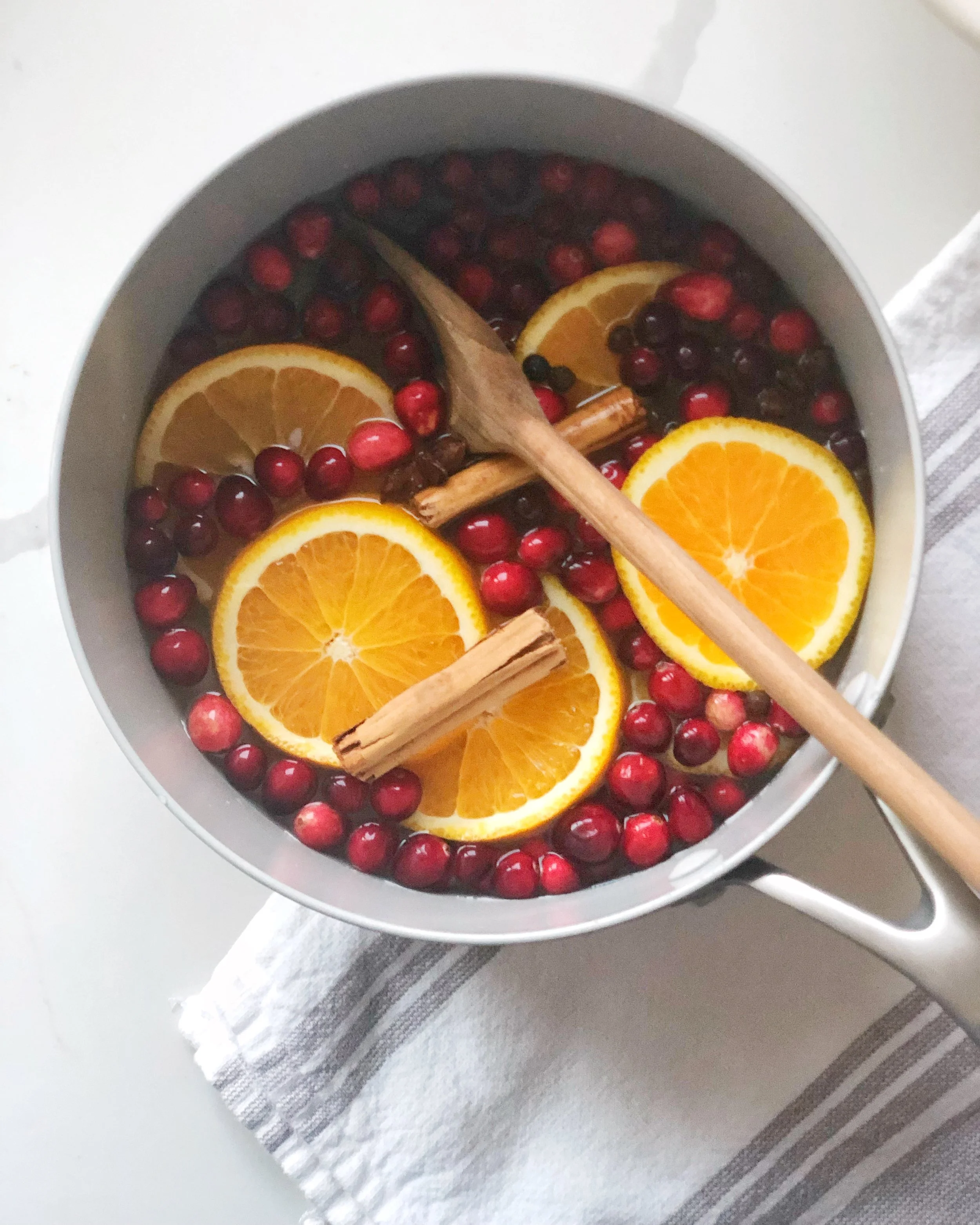 *note this is what the stovetop potpourri looks like! whole oranges slices work for that but stick with the juice and zest for the sauce!