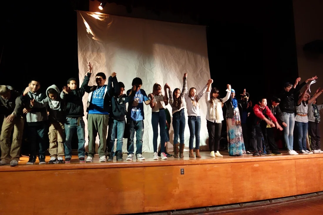 MLK MS student shadow play performance