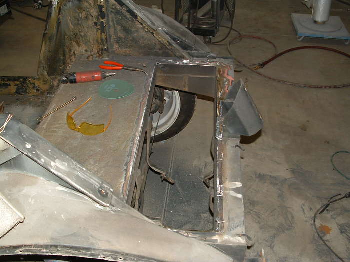 Here the old fuel tank cover has been cut out to make room for the new one. The new tank will be stainless steel and the fuel pump will be internal