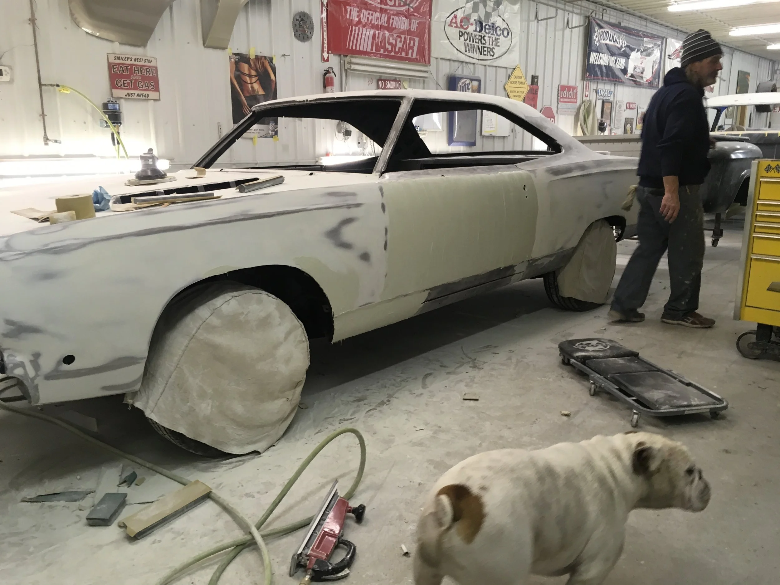 Finishing mud work on 68 Plymouth GTX.