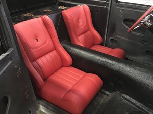 essex-minnesota-hot-rod-custom-builds-car-restoration-red-leather-seat.jpg