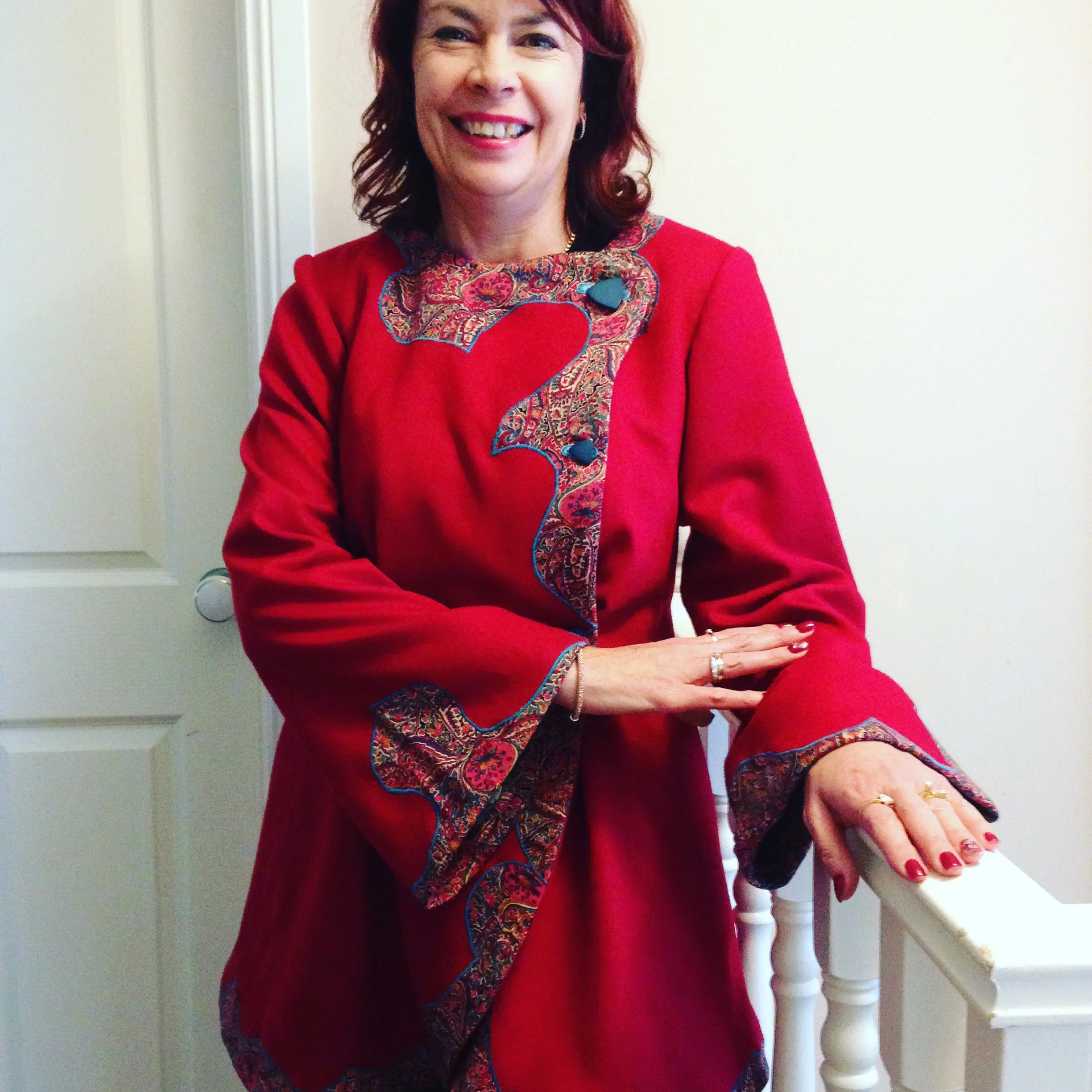 I created this winter coat for Lorelle from a bright red wool and then added an appliqué in a Liberty of London wool print. I randomly create the appliqué design as I go!