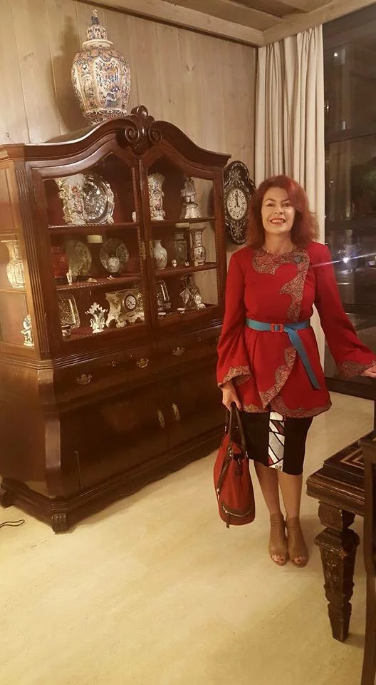 Lorelle wearing her Penelope Red Winter Coat in Spain...