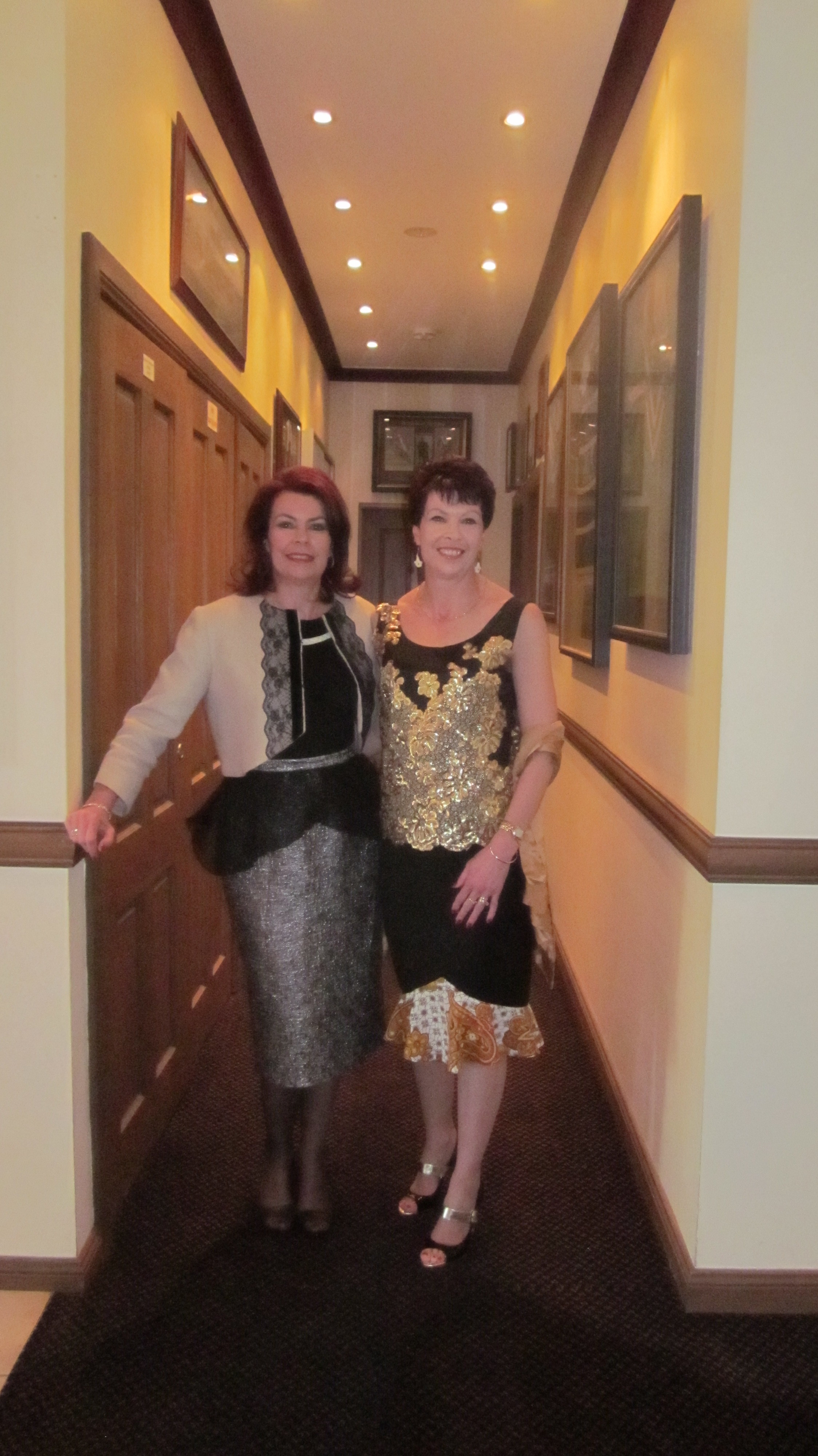 Lorelle wears the Gothic Coffee Bolero with the Silver Drama Skirt. Leanne wears the black and gold Cleopatra Blouse and the black and gold Tulip Skirt.