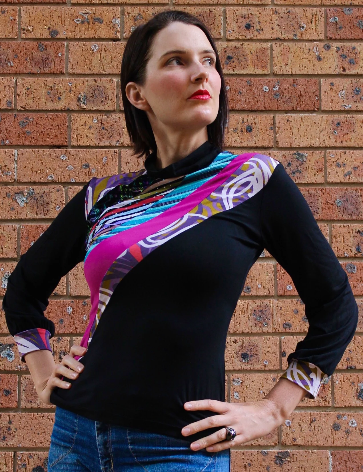 I am wearing my own one of a kind version of this Skivvy design. I love how these colours and prints work so well together but yet are so different! I am not a big fan of black, so if I make anything black for myself, it needs to have something with a bit of pizzazz! I think this fits the bill!