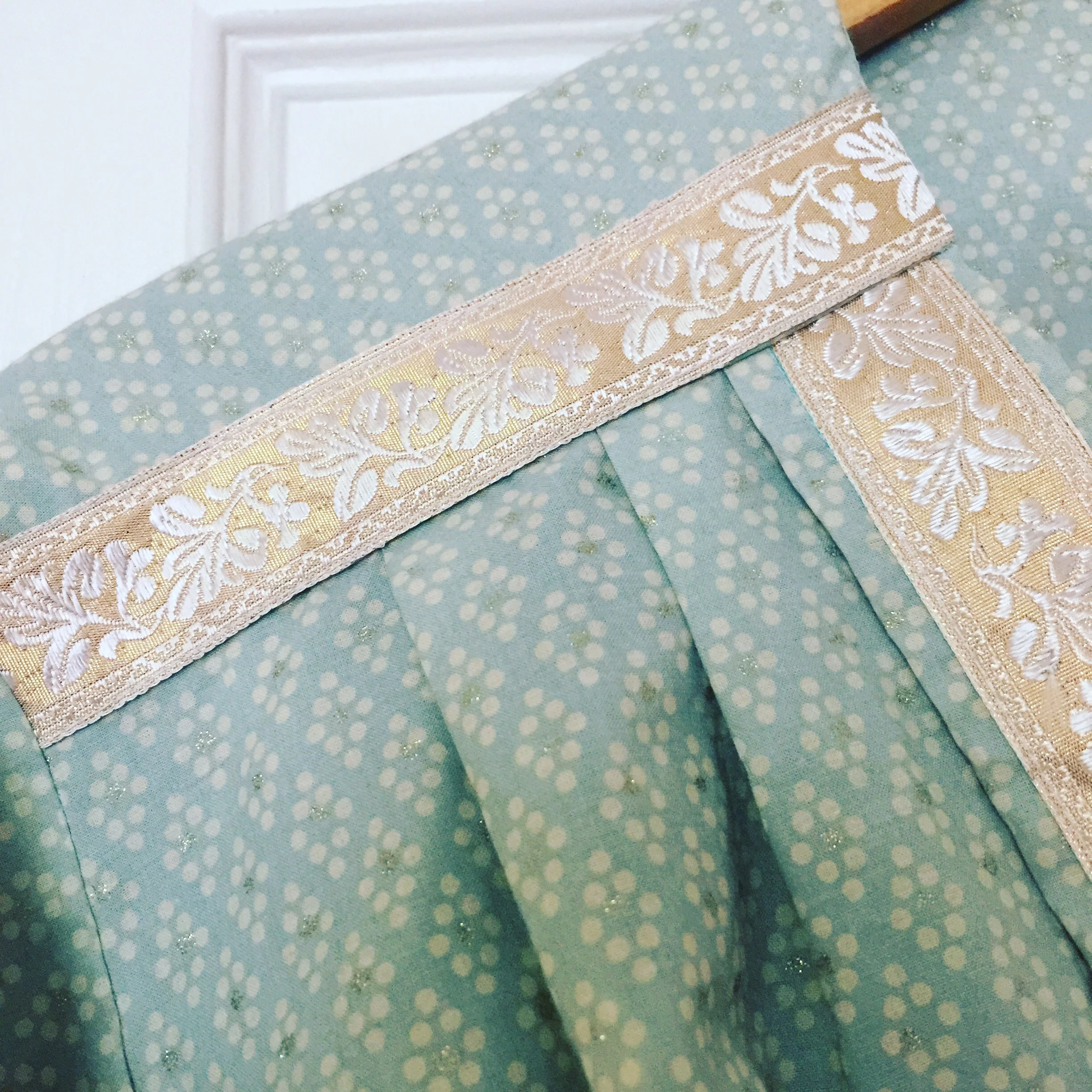 The Pastel Kimono, handmade from a mint green, cream and gold cotton fabric and a vintage pink and gold trim.