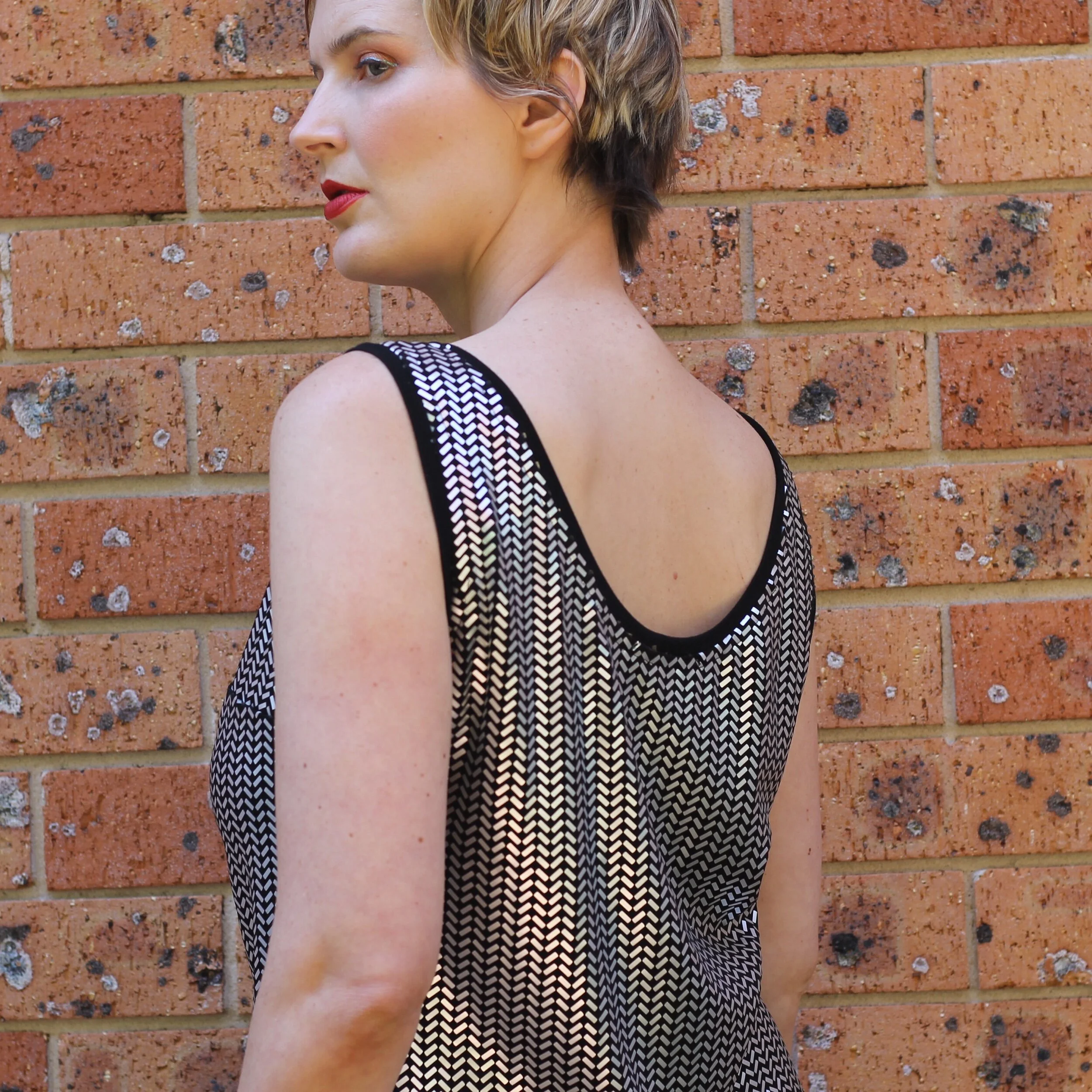 A Relaxed Fit Knit Top with Elegance 