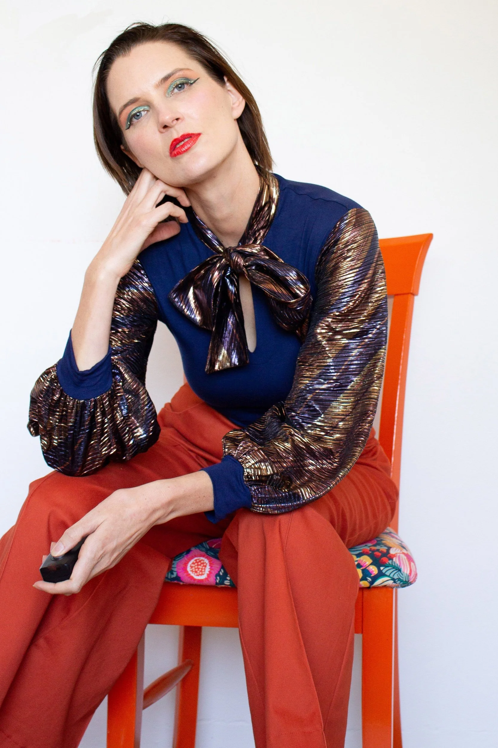 PenelopeRED-Bling-Bow-Tie-Top-Rust-Flared-Pants.jpeg