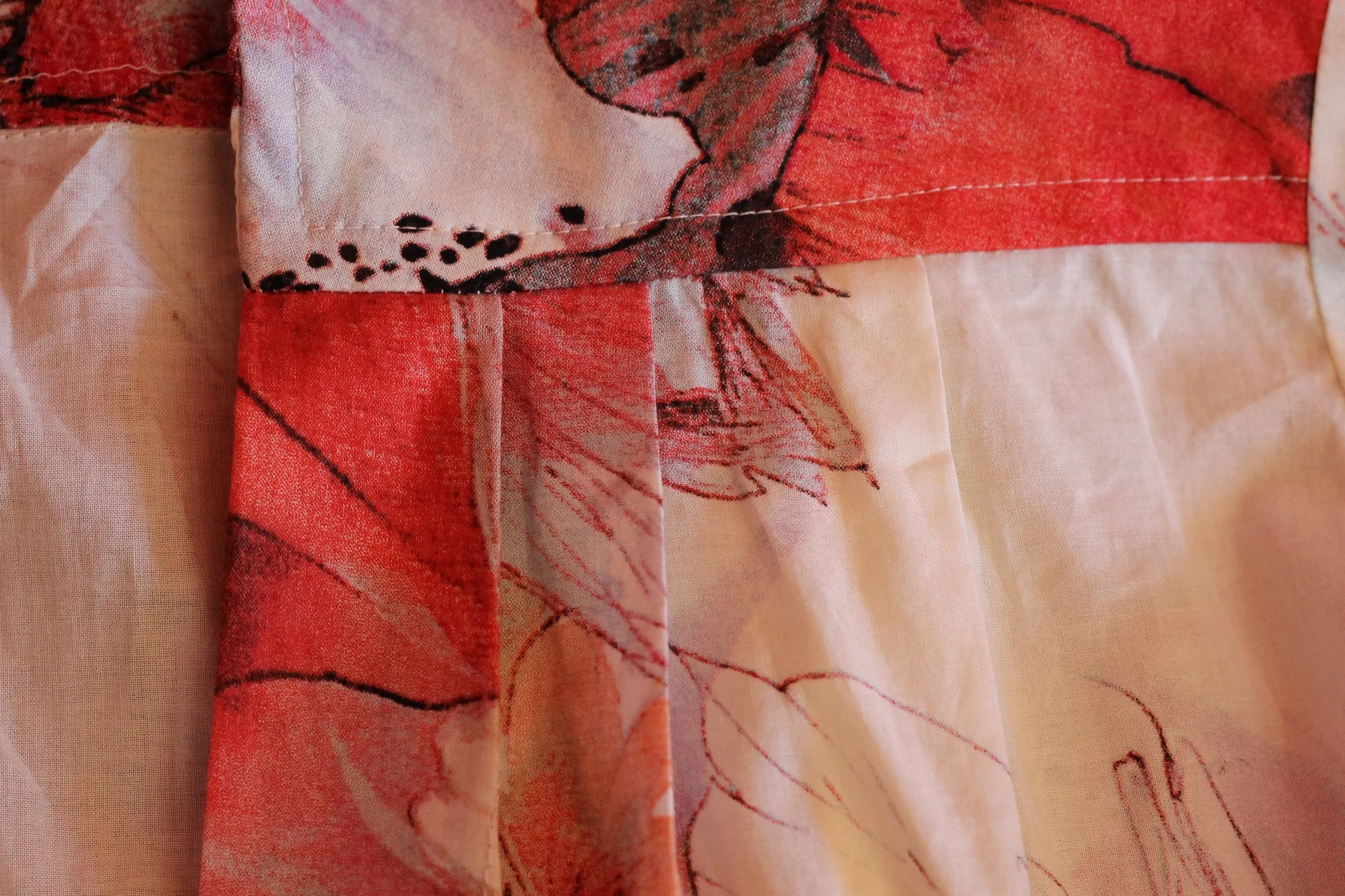 Red and white floral kimono inspired blouse, handmade for women. Up close and detail image.
