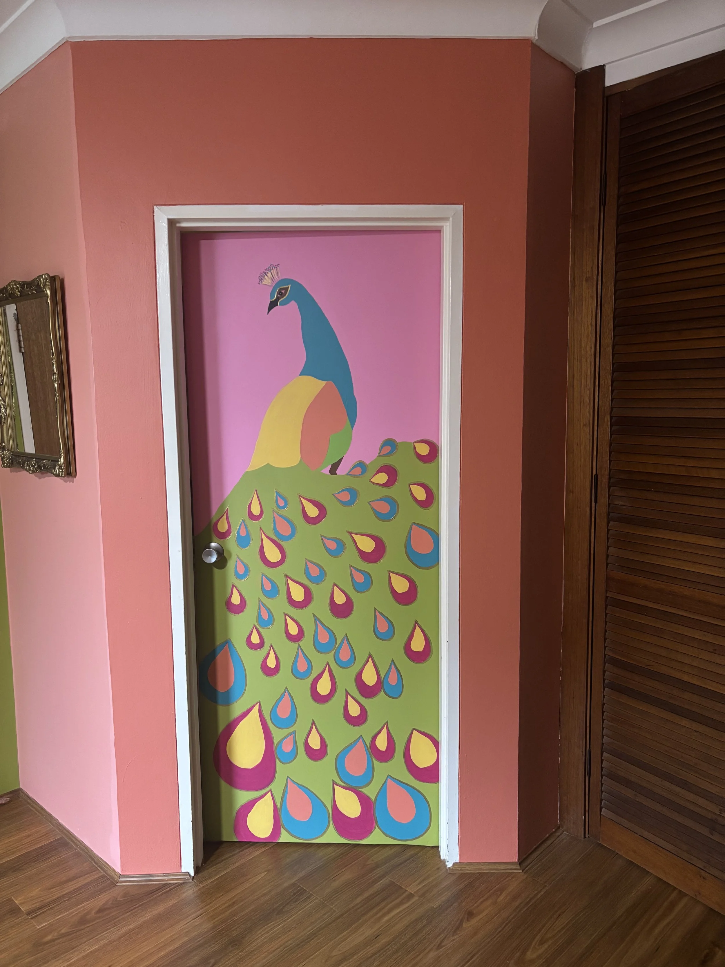 Living Room Renovation with a Peacock Mural