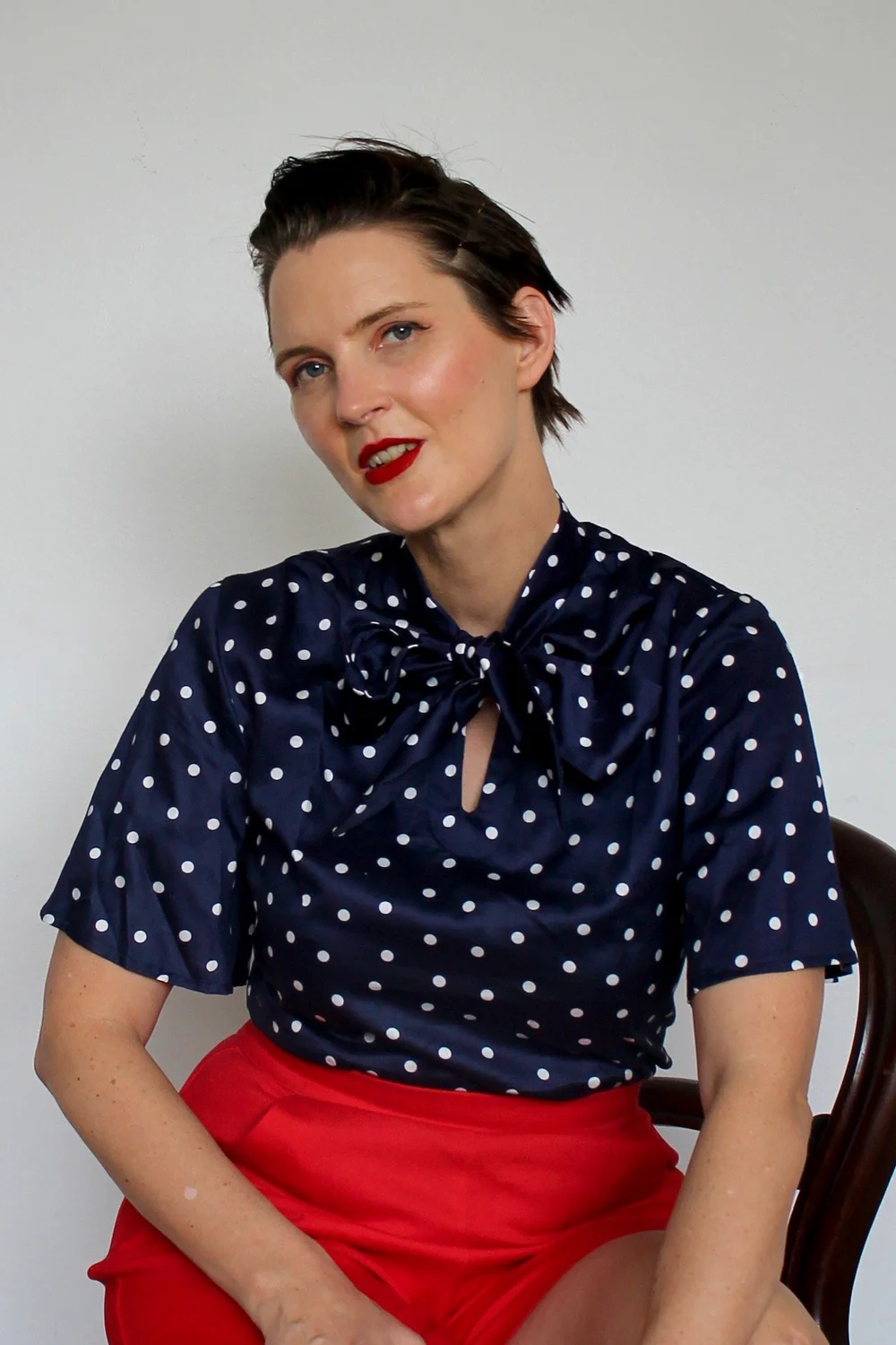 A classic PenelopeRED style, in a beautiful navy blue and white Polka Dot  — PENELOPE RED