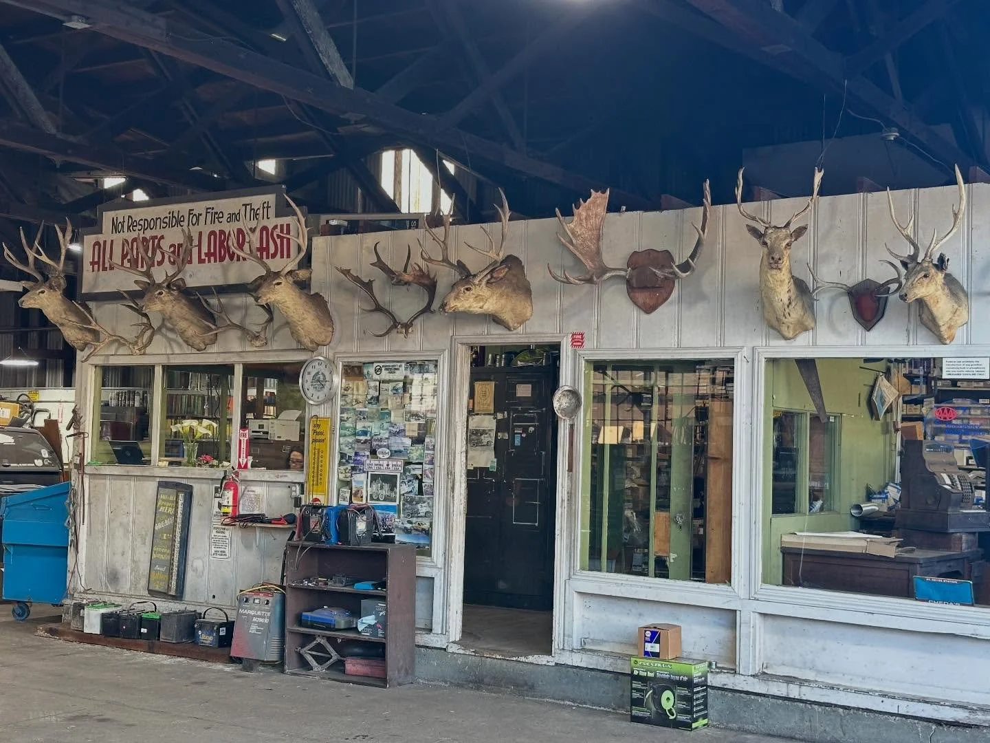 &ldquo;Not Responsible for Fire and Theft&rdquo; 
Local gas station decor from a hundred years of giving service to Point Reyes. The center of a community is where it holds its authenticity. Chedas garage doing business here for over a hundred years.