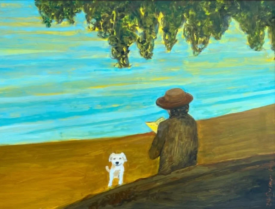Woman reading poetry to her little dog
