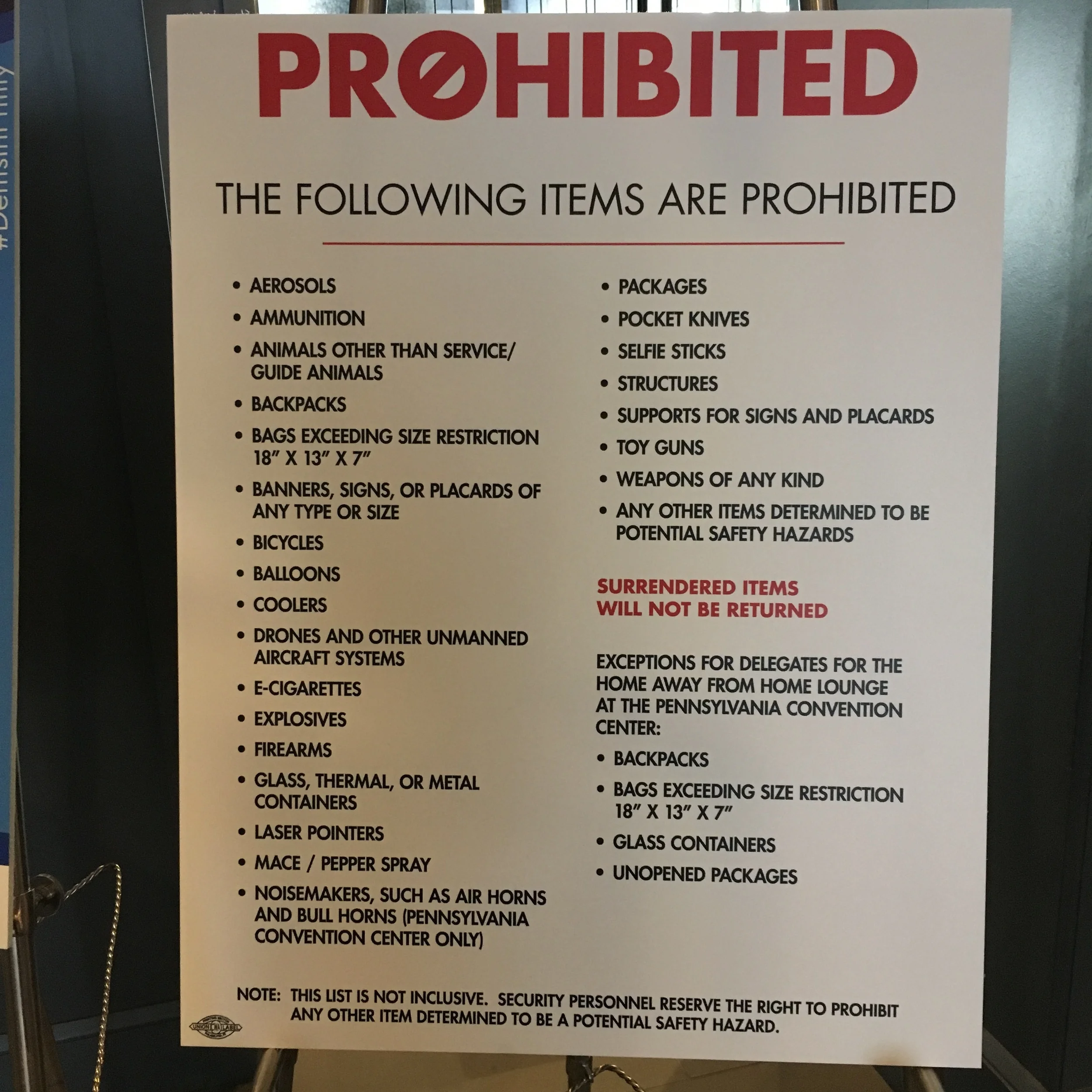 DNC Day 1: Sign posted in the lobby of the Logan. Lists like these get longer every year. Having been produced by the Democratic National Committee, this placard carries the union label.