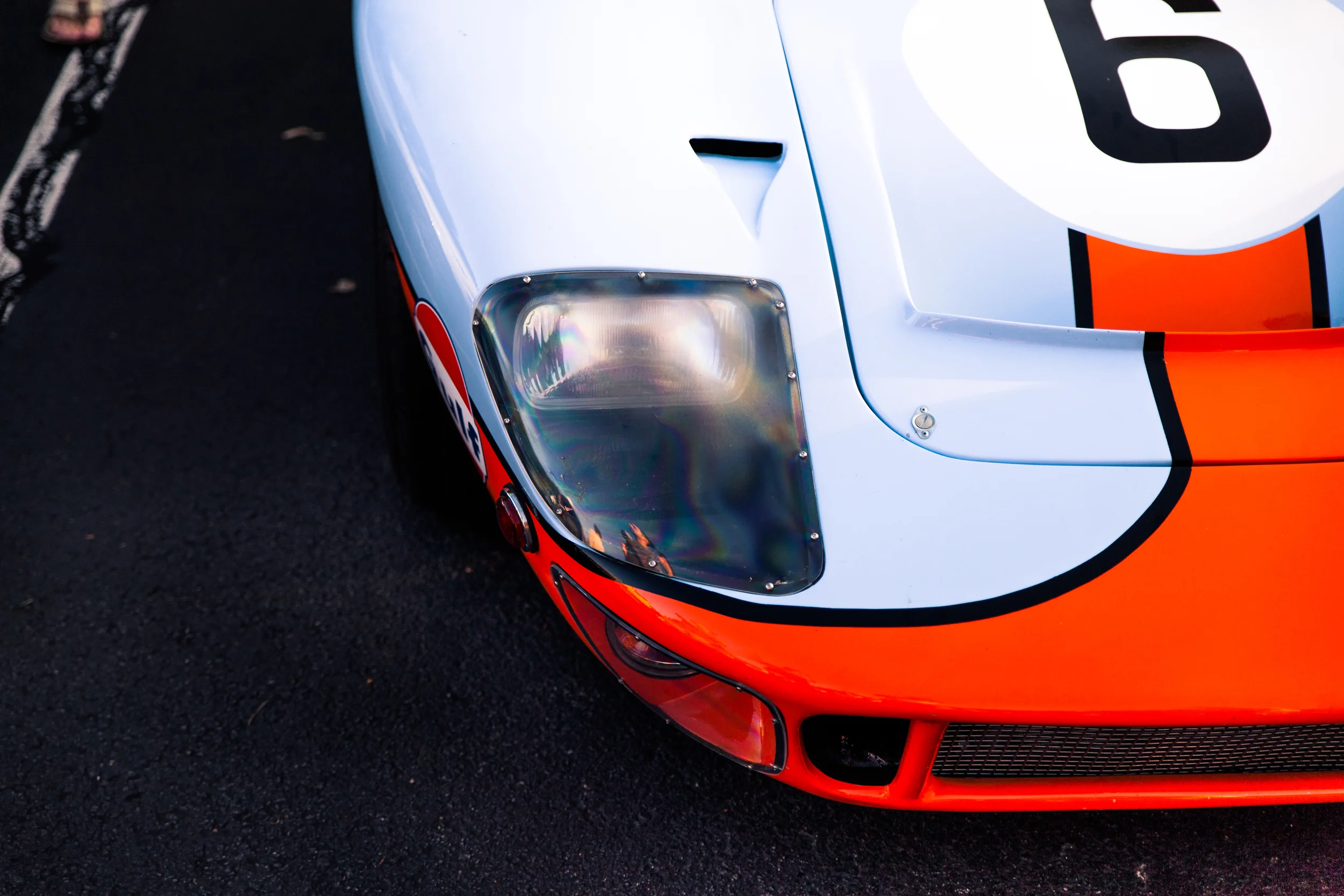 Right off the bat I was drawn toward the iconic blue and orange race scheme. The colors contrasted by the dark pavement looked perfect for a topside view. 