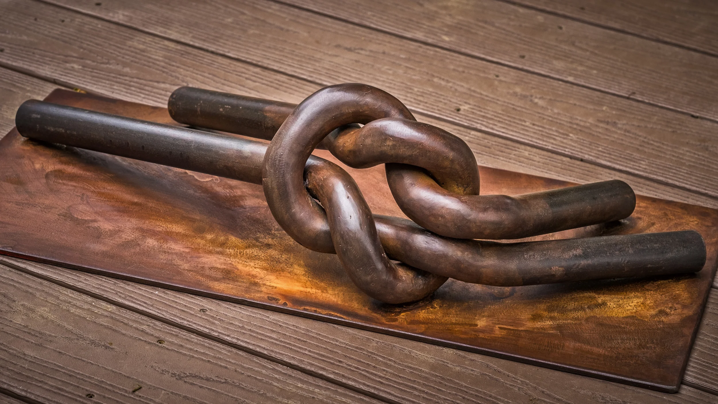 “Just Knot Ready” Forged pipe, rust patina and wax.