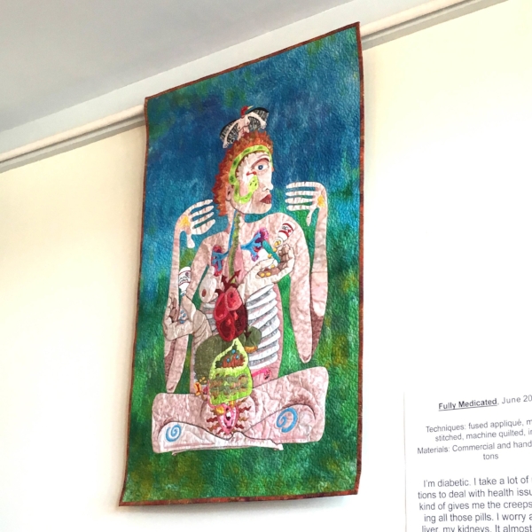 Fully Medicated by Kathy Nida, hanging at SPOOL for Chattanooga Quilt Week (Photo by me)