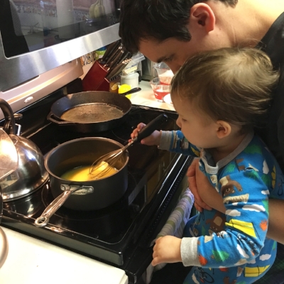 Helping to stir the melting butter