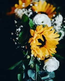 Elegant Cascading Bouquet with Sunflowers, Roses, Lisianthus with a touch of Babies Breathe