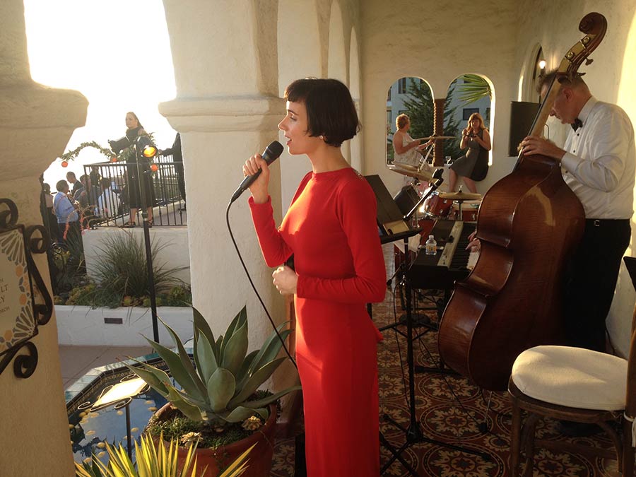 Victoria with trio at beach mansion in Santa Barbara.